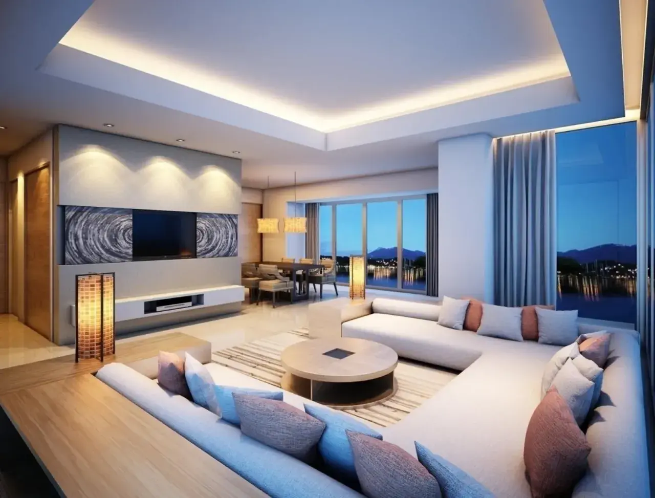 Illuminazione a led integrata in un controsoffitto in cartongesso, che valorizza un salotto moderno con vista lago.